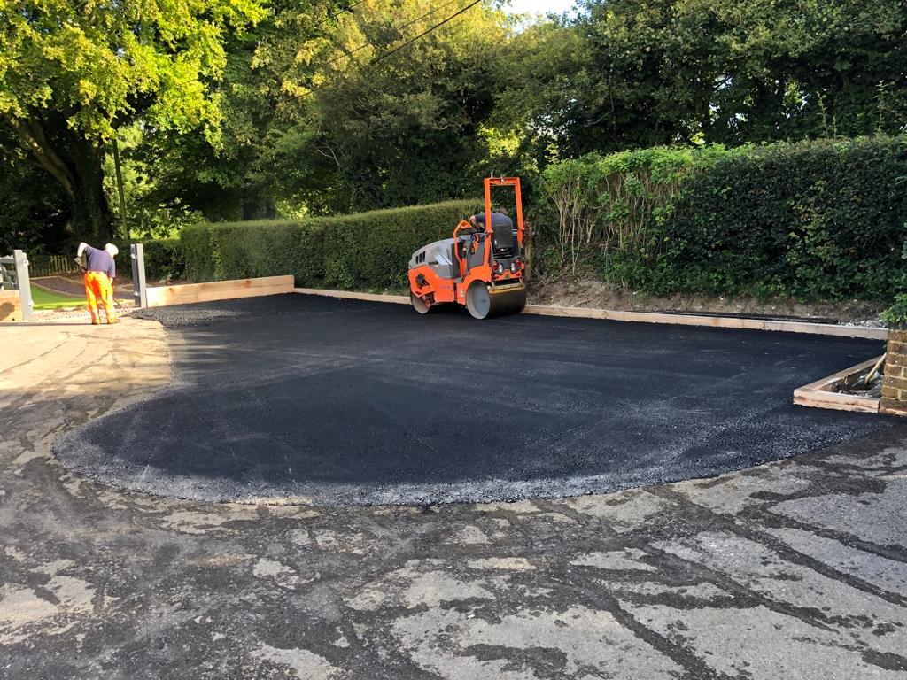 This is a photo of a bitumen driveway which is in the process of being installed by Gympie Surfacing Solutions