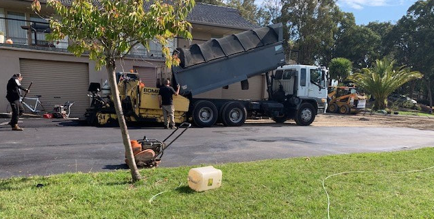 This is a photo of an asphalt driveway which is in the process of being installed by Gympie Surfacing Solutions