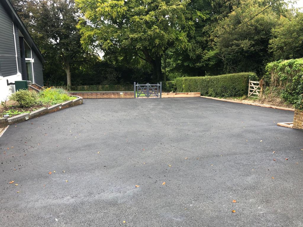 This is a photo of a bitumen driveway which is in the process of being installed by Gympie Surfacing Solutions